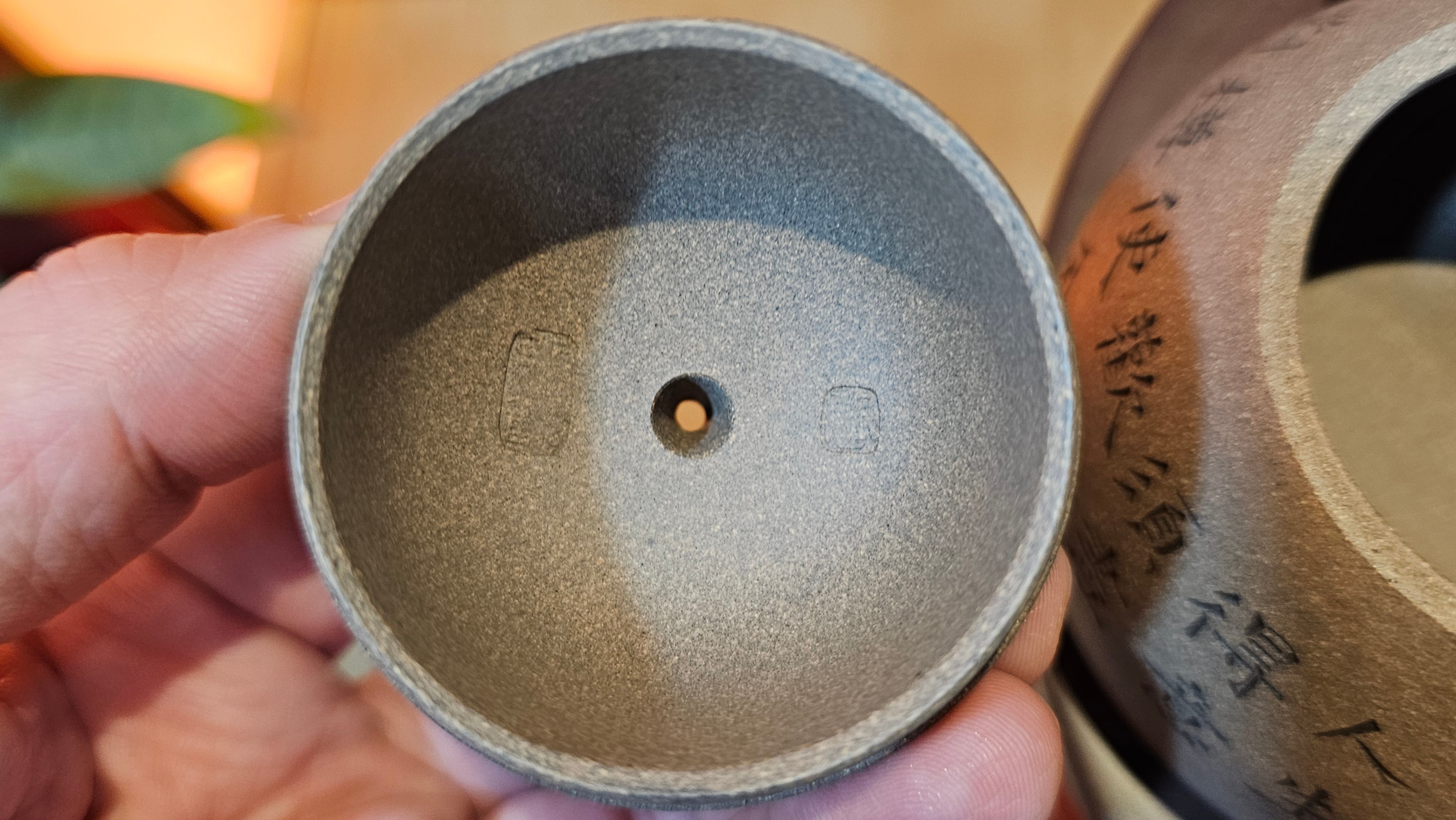 Ban Yue Hu《半月壶》~ "Half Moon Pot", 140.8ml, Qing Hui Duan 青灰段泥, by our Craftsman Zhang Huan 张欢, "Qing Gong Tu" 清供图 Engraving by Craftsman Nan Shan Lao Ren 南山老人 ~ Congratulations to Ms M.L.! 0831hrs 10th August 2025! Phoenix, AZ!