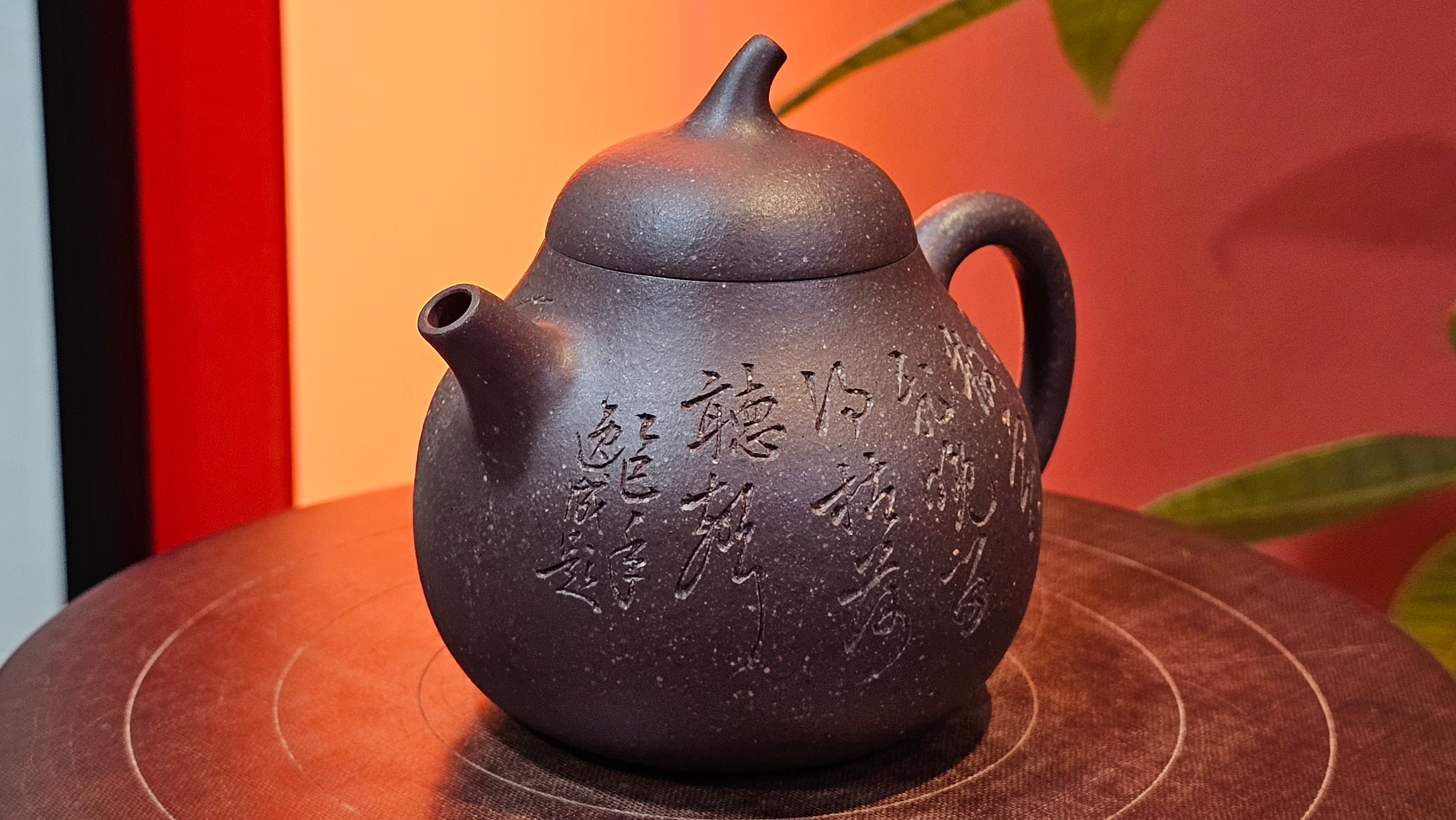 Qie Gua《茄瓜》~ "The Gourd", 152.8ml, Hei Zi Ni 黑紫泥, by our Craftsman Zhang Huan 张欢, Calligraphy and Lotus Engraving by Craftsman Yi Cheng 逸成 ~ Congratulations!to Dr L.L.! 1327hrs 19th Sept 2025! Ventura, CA!