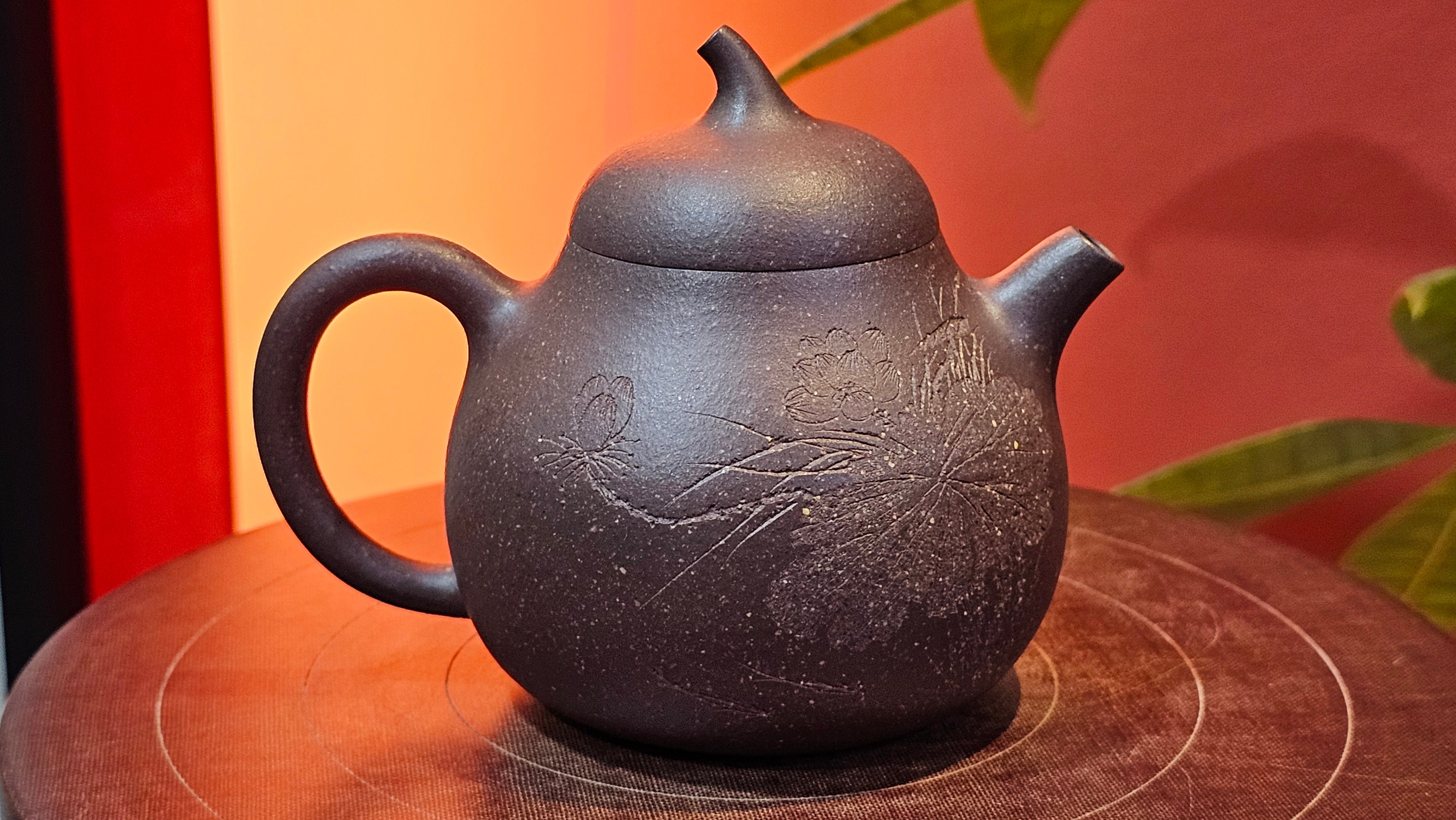 Qie Gua《茄瓜》~ "The Gourd", 152.8ml, Hei Zi Ni 黑紫泥, by our Craftsman Zhang Huan 张欢, Calligraphy and Lotus Engraving by Craftsman Yi Cheng 逸成 ~ Congratulations!to Dr L.L.! 1327hrs 19th Sept 2025! Ventura, CA!