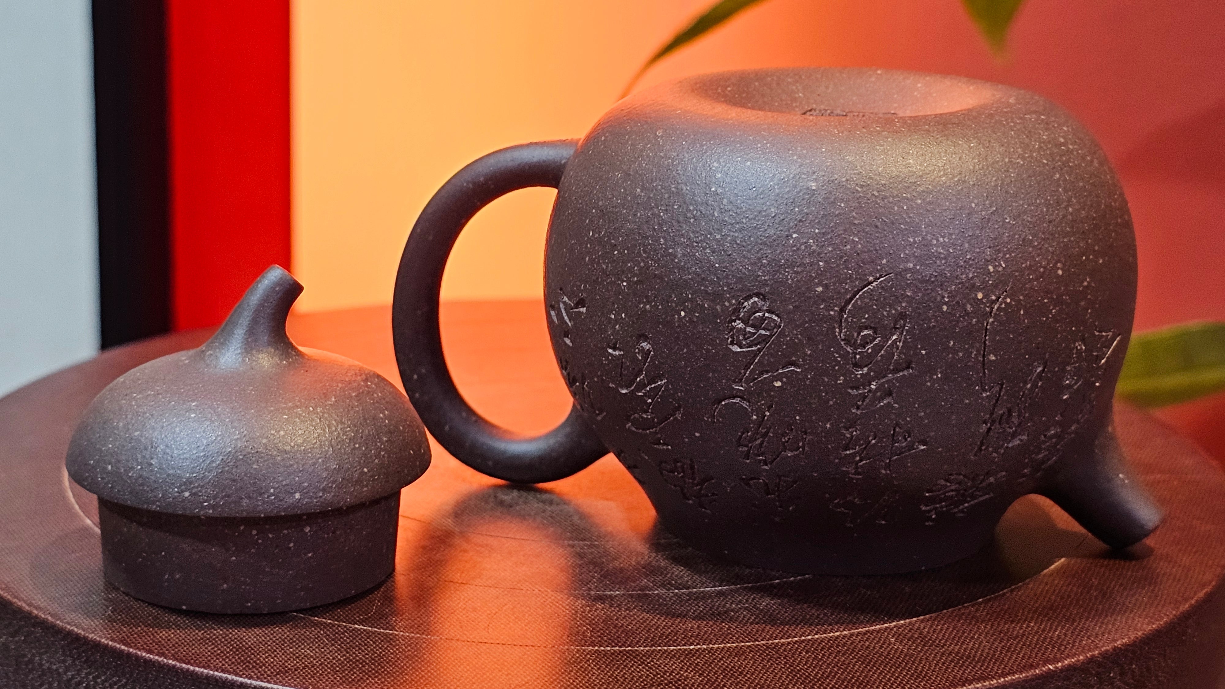 Qie Gua《茄瓜》~ "The Gourd", 152.8ml, Hei Zi Ni 黑紫泥, by our Craftsman Zhang Huan 张欢, Calligraphy and Lotus Engraving by Craftsman Yi Cheng 逸成 ~ Congratulations!to Dr L.L.! 1327hrs 19th Sept 2025! Ventura, CA!