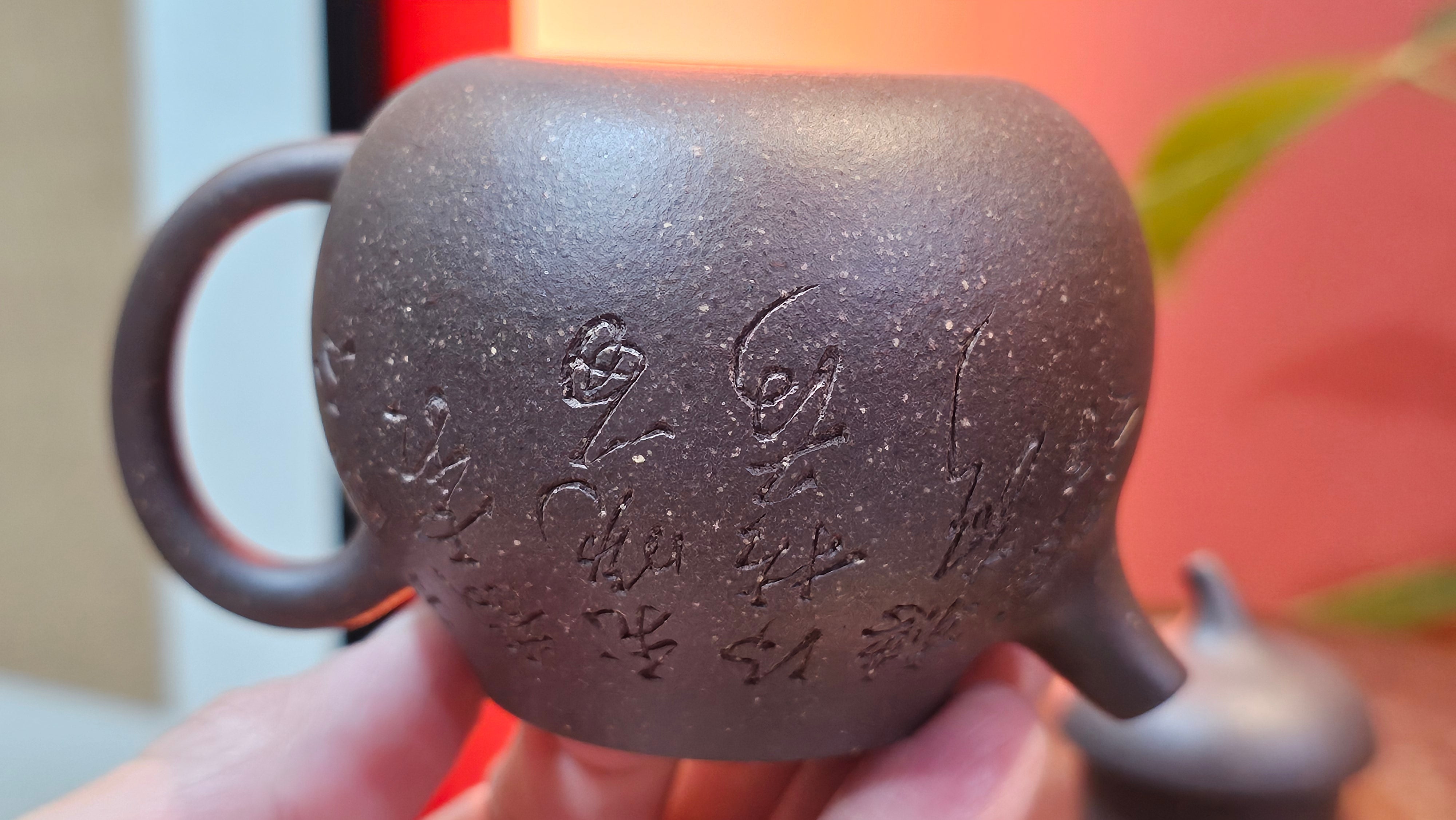 Qie Gua《茄瓜》~ "The Gourd", 152.8ml, Hei Zi Ni 黑紫泥, by our Craftsman Zhang Huan 张欢, Calligraphy and Lotus Engraving by Craftsman Yi Cheng 逸成 ~ Congratulations!to Dr L.L.! 1327hrs 19th Sept 2025! Ventura, CA!